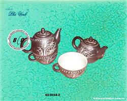 Teapot and cup